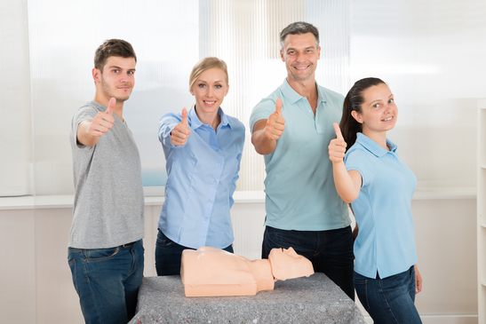 People With Thumbs Up Sign While Learning Resuscitation